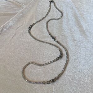Long beaded necklace with rondelle stations